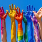 Colorful Raised Hands in Symbolism for LGBTQIA and Pride Month in Iceland